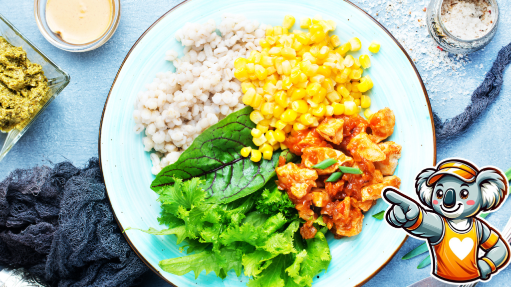 Colorful healthy meal with rice, corn, and curry chicken.